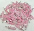Bulk collection of pink natural crystal hexagonal column bullet stone pendants with silver caps - Pink Dyed Stone