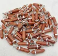 Hexagonal gold sandstone bullet point pendant with silver-plated metal bail charm - Gold Sandstone