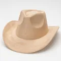 Beige suede western cowboy hat featuring a vintage curved brim and detailed stitching - Light Camel