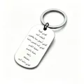 Close-up of stainless steel tag keychain with Arabic inspirational engraving. - Arabic Inspirational Style (JPB-131)