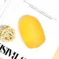 Orange oval maltose squishy toy for stress relief on minimalist white background - 138g Yellow Candy Squeeze (Boxed)