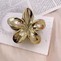 Elegant gold metallic frangipani flower hair claw clip perfect for beach vacation styling - 8cm Plated KC Gold (Bright)