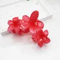Elegant red translucent flower hair claw clip featuring a unique triple blossom design. - 11cm Triple Plumeria Style / Red