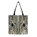 Front view of large canvas tote bag featuring a striking symmetrical zebra print - Symmetrical Zebra Pattern (hm2700)