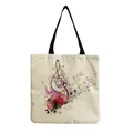 Detailed shot of casual linen tote bag featuring musical note and rose flower print - Rose Staff Music Style (hm7325)