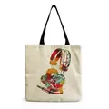 Artistic watercolor headphone print detail on a durable cream canvas shopping bag - Watercolor Headphone Style (hm7327)