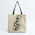 Detail view of a linen tote bag with artistic musical note print - Large Treble Clef Beige Style (hm7332)