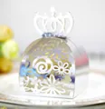 Close-up of elegant silver laser-cut crown candy box featuring intricate floral pattern details - Reflective Silver