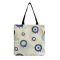 Detail of the linen-textured fabric and blue Evil Eye pattern on the shoulder bag. - Turkish Evil Eye (hm2713)
