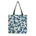 Detail of durable canvas tote bag featuring vibrant blue butterfly print pattern - Dense Blue Butterflies (hm2718)
