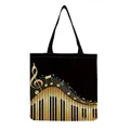 Detail view of foldable canvas tote bag with golden piano keyboard and music notes print - Golden Piano Keyboard Notes Black Style (hm7350)