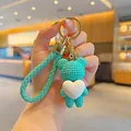Woven turquoise bear keychain with white heart charm and gold-tone ring - Heart Hug Bear / Green