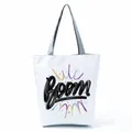 White canvas tote bag featuring a bold black Boom graffiti print and colorful accents - Colorful Explosion Graffiti (hl5284)