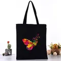 Borsa shopper in tela nera con vivace stampa a farfalla colorata per l'uso quotidiano - Stile farfalla colorata spray (L4228-3) / Nero