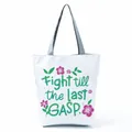 Close-up detail showing the vibrant floral print and inspirational quote on white tote bag - Green Inspirational Slogan Floral (hl5290)