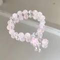 Elegant sweet pink crystal beaded bracelet featuring a pink star charm and star pendants - Meteor Shower Pink