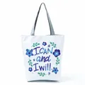 White tote bag detail with blue floral print and 'I CAN and I will' motivational quote. - Blue-Purple Floral Print (hl5299)