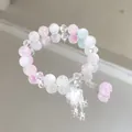 Mori style beaded crystal bracelet with star charm in soft pink and white tones. - Meteor Shower Multicolor