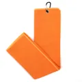 Detail view of orange microfiber waffle golf towel with black carabiner clip attachment. - Orange