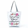 Detailed view showing the floral wreath and English quote print on a white tote bag - Hand-painted Floral Wreath (hl5301)