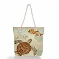 Detail view of a vintage sea turtle print beach bag with thick decorative rope handles - Sea Turtle Conch Print (ms4541b)