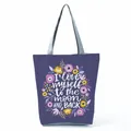 Detailed view of purple tote bag featuring floral print and inspirational quote - Purple Floral Moon Slogan (hl5310)