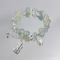 Elegant forest style crystal beaded bracelet with silver charms on mirrored surface - Ruyi Bamboo Cyan-Yellow