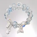 Elegant double-layered light blue crackled crystal bracelet with a silver mermaid tail charm - Sparkling Fish Tail Blue
