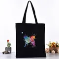 Minimalist black canvas tote bag featuring a vibrant and colorful butterfly art print - Colorful Ink Splash Butterfly Style (L4228-21) / Black