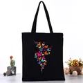 Durable black canvas tote bag featuring a vibrant colorful butterfly series print design - Vertical Arranged Colorful Butterflies Style (L4228-23) / Black