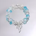 Elegant blue cracked crystal beaded bracelet featuring silver bow and flower charms - Peach Blossom Bow Blue