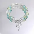 Ethereal forest style beaded crystal bracelet with sweet silver bow charm details - Peach Blossom Bow Green