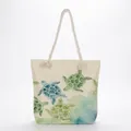 Eco-friendly canvas tote bag featuring sea turtle prints and nautical rope handles. - Gradient Sea Turtle Print (msk2387)