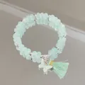 Forest style mint green beaded bracelet with butterfly charm and elegant tassel details - Ice Butterfly Tassel Green