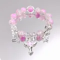 Sweet pink and clear crystal beaded bracelet featuring star and winged wand charms - Crystal Fairy Wand Purple