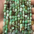 Close-up of natural irregular green stone chips for DIY jewelry making - 6-8mm (38cm Strand) / Australian Jade
