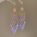 Elegant purple bead tassel drop earrings with golden hollow design for a chic vacation look - Purple Waterdrop Beaded Style (25#)