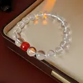 Elegante pulsera de cuentas de cuarzo transparente con una única cuenta roja. - Pulsera 65# (Con Caja de Regalo) / Cristal Transparente