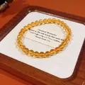 Elegante pulsera de cuentas de cristal de citrino amarillo en una bandeja de madera de lujo. - Pulsera 73# (Con Caja de Regalo) / Citrina Amarilla 6mm