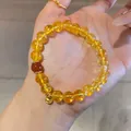 Elegante pulsera de cuentas de cristal amarillo con detalle rojo y amuleto dorado. - Pulsera 14# (Colgante de Oro y Con Caja de Regalo) / Citrina Ágata