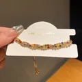 Close-up of a luxury gold-plated bracelet with colorful zircon stones on display - 2# Bracelet