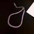 Eleganter vergoldeter verstellbarer Armreif mit funkelnden lila rechteckigen Zirkonia - Ovaler Zirkonia (73) / Silber-Lila