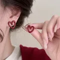 Vintage red hollow heart-shaped stud earrings with a glossy oil-dripping finish - Red Hollow Heart (Silver Earring Post 36#)