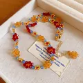 Handmade colorful acrylic beaded necklace with flower pattern and gold extension chain - Geometric Flower / Gold-Multicolor