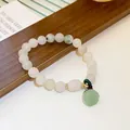 Elegante pulsera de cuentas de cristal de fresa con un dije de flor verde estilo jade - Pulsera 43# (Colgante de Capullo de Flor) / Blanco-Vaina de Loto