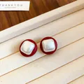 Vintage style red round stud earrings with square pearly centers on beige display tray - Square Silver Earring Post Style (10#) / Red