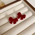Red velvet bow stud earrings displayed in a classic white jewelry organizer box - Flocked Bowknot Silver Earring Post Style (25#) / Red