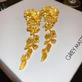 Elegant gold-plated floral tassel dangle earrings with silver needles for fashion jewelry - Gold