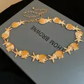 Eleganter goldener Metall-Taillenkettengürtel mit Seestern- und Muschelanhängern für Damen Mode - 115cm / Seestern Muschel Perle Stil (5#) / Gold