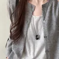 Elegante minimalistische ketting met kleine paardenhanger en zwarte kralen voor dames - Zwarte Halfronde Kraal Zilver Paard Stijl (49#)